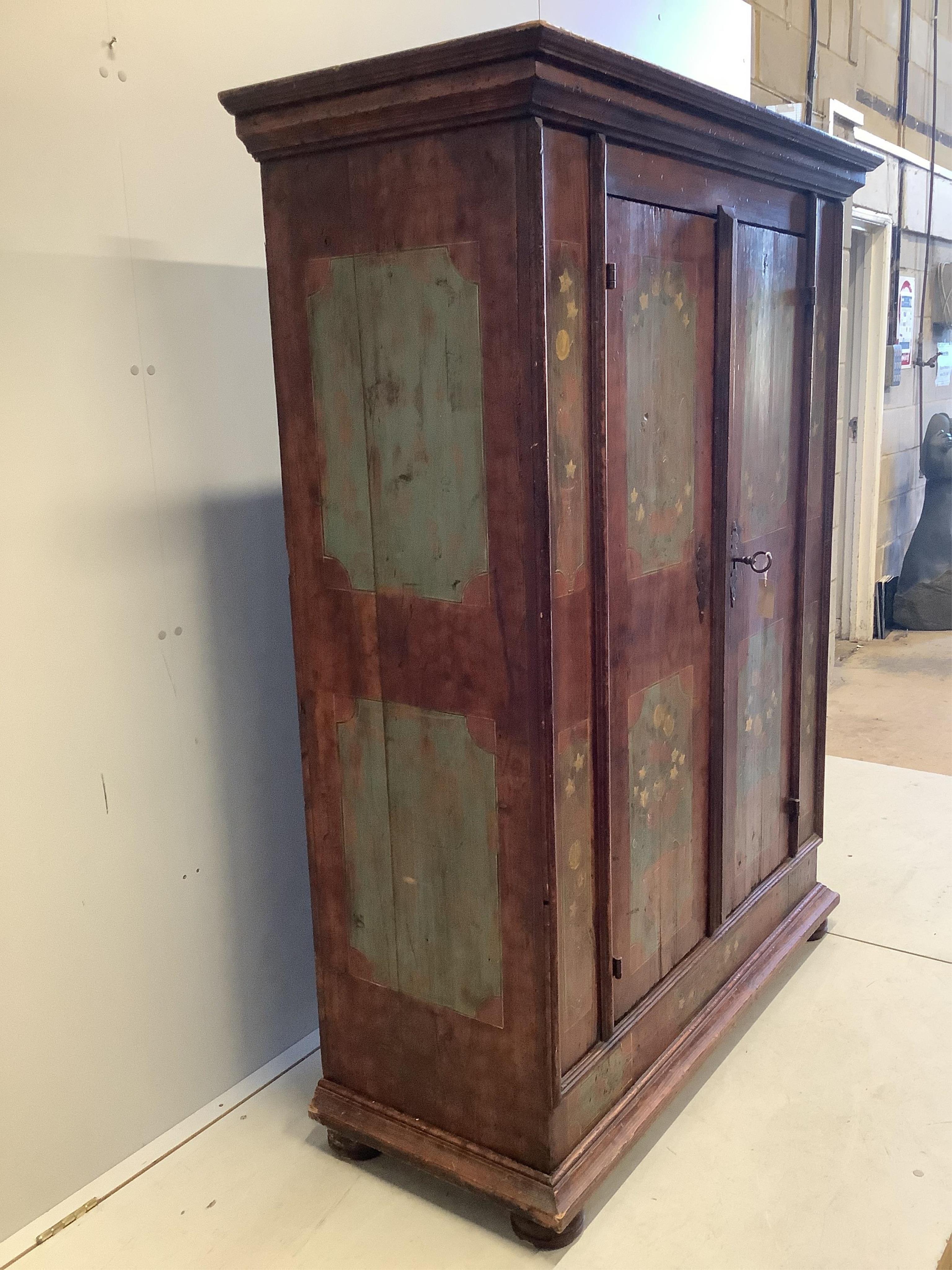 An 18th century Swiss painted pine armoire, width 131cm, depth 54cm, height 169cm. Condition - fair